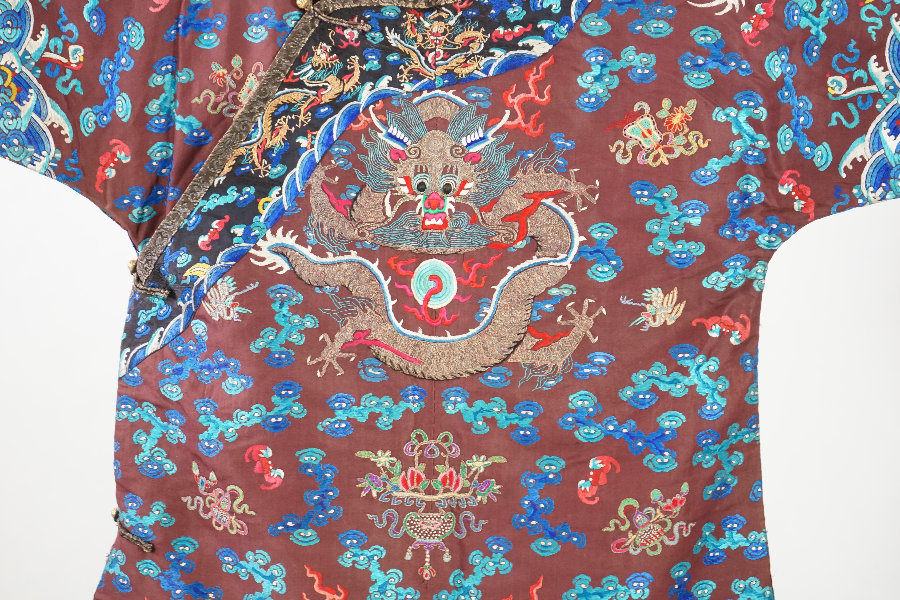 A Chinese brown silk court robe for an Imperial Duke, jifu, late 19th century